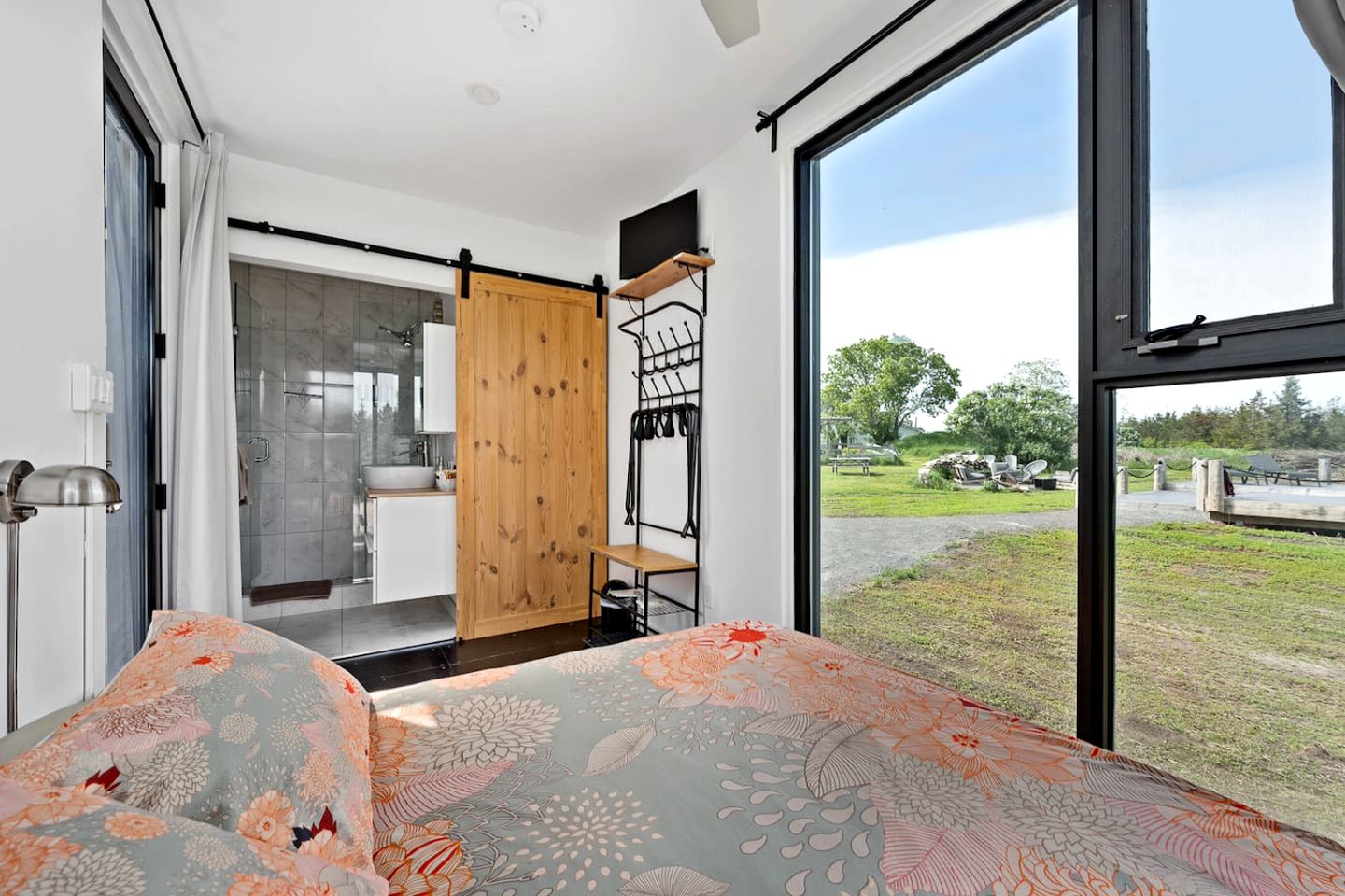 Stylish Modern Shipping Container Retreat with Scenic Meadow Views Near Prince Edward County, Ontario