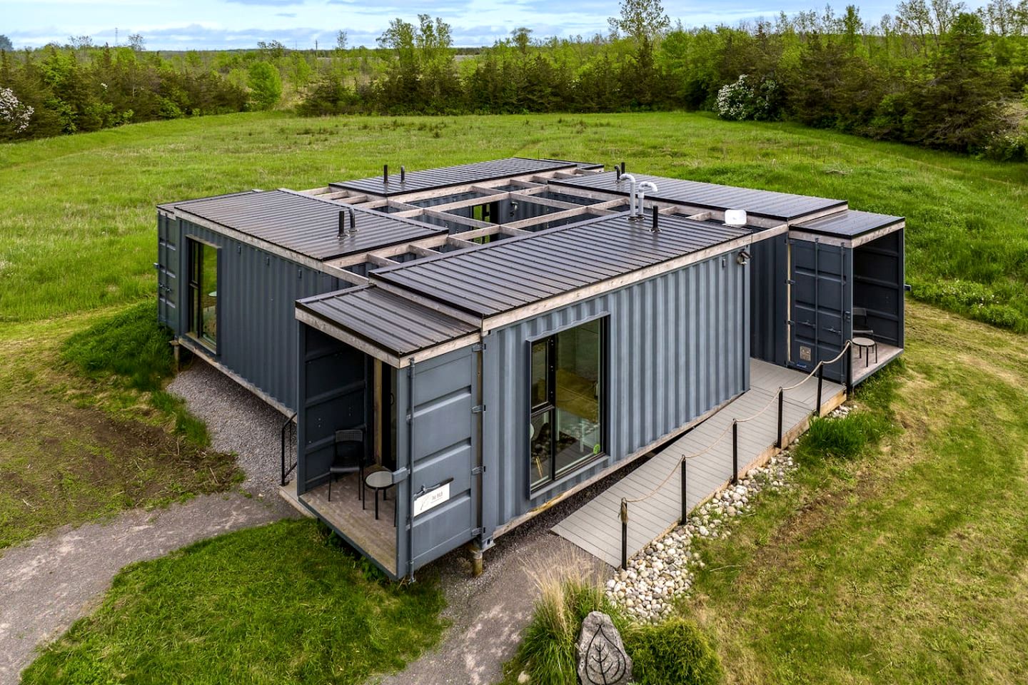Stylish Modern Shipping Container Retreat with Scenic Meadow Views Near Prince Edward County, Ontario