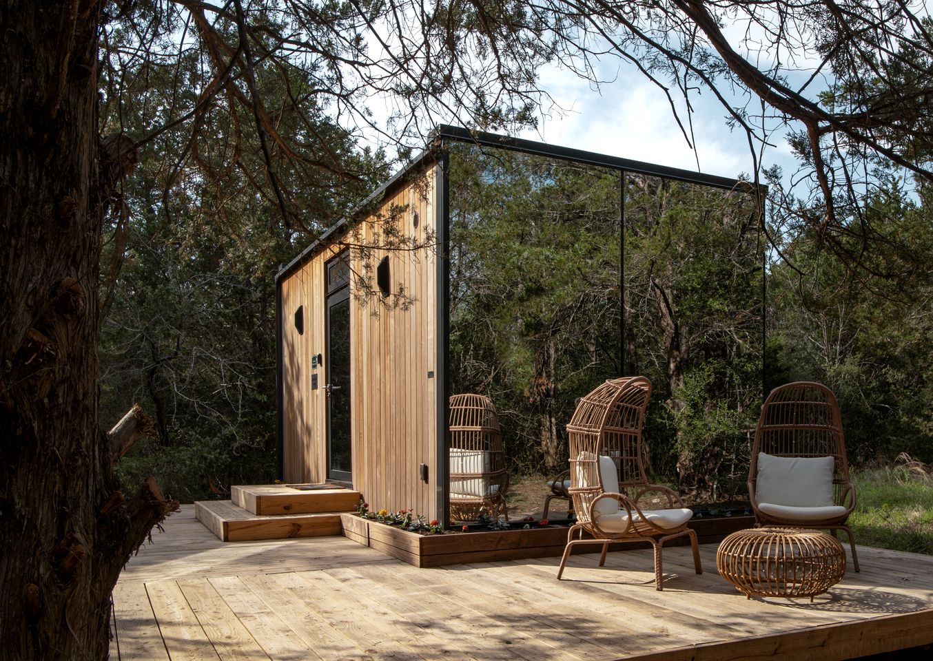 Whimsical Flower-Inspired Mirror Cabin by the Lake in the Enchanted Forests of Texas