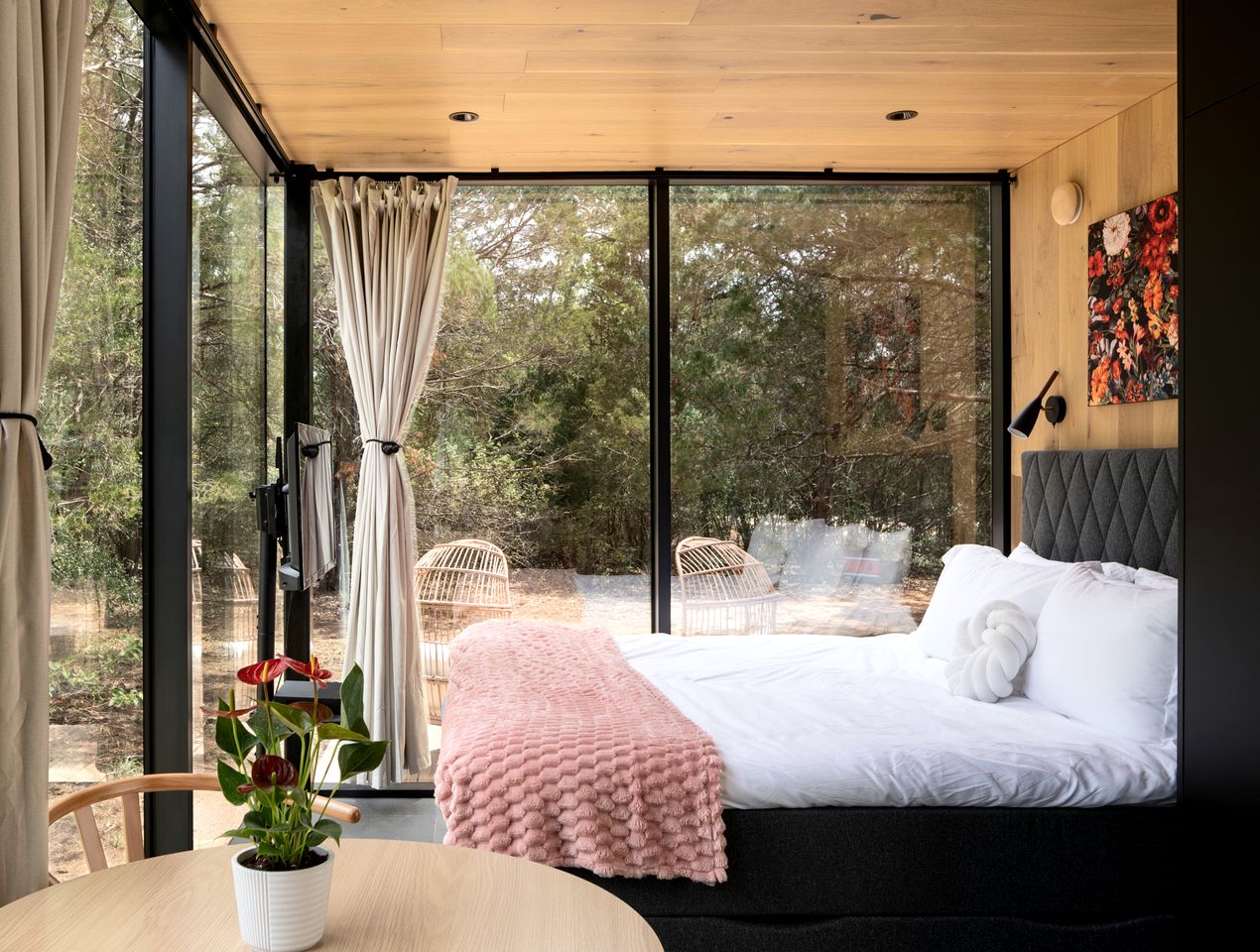 Whimsical Flower-Inspired Mirror Cabin by the Lake in the Enchanted Forests of Texas