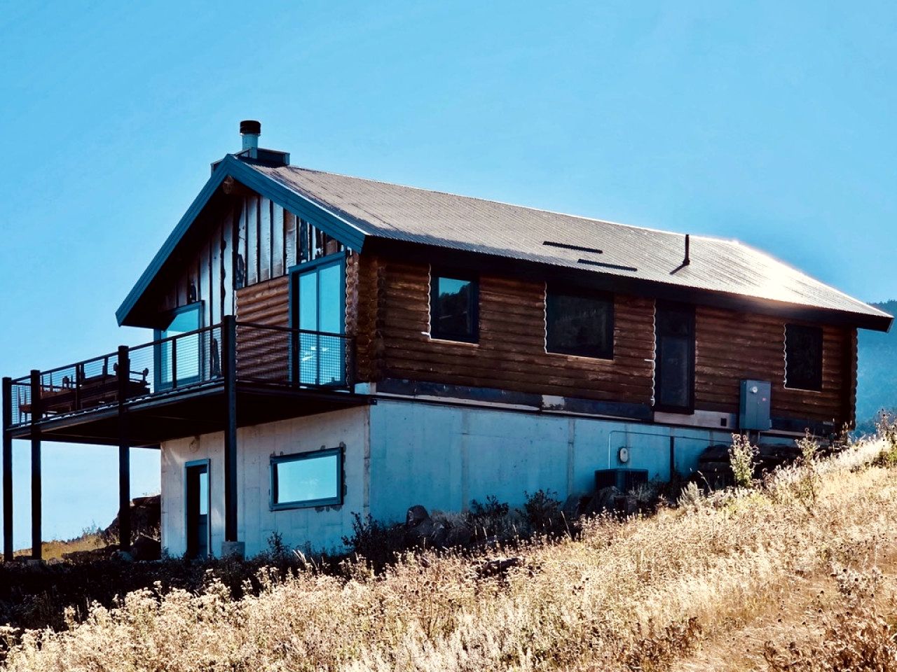 Rustic Mountain Cabin Retreat with Wrap-Around Porch & Scenic Views Near Livingston, Montana