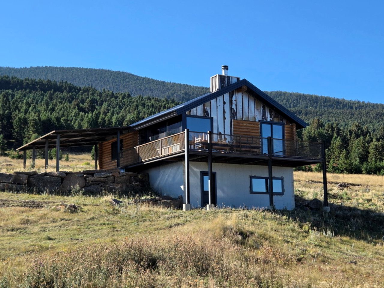 Rustic Mountain Cabin Retreat with Wrap-Around Porch & Scenic Views Near Livingston, Montana