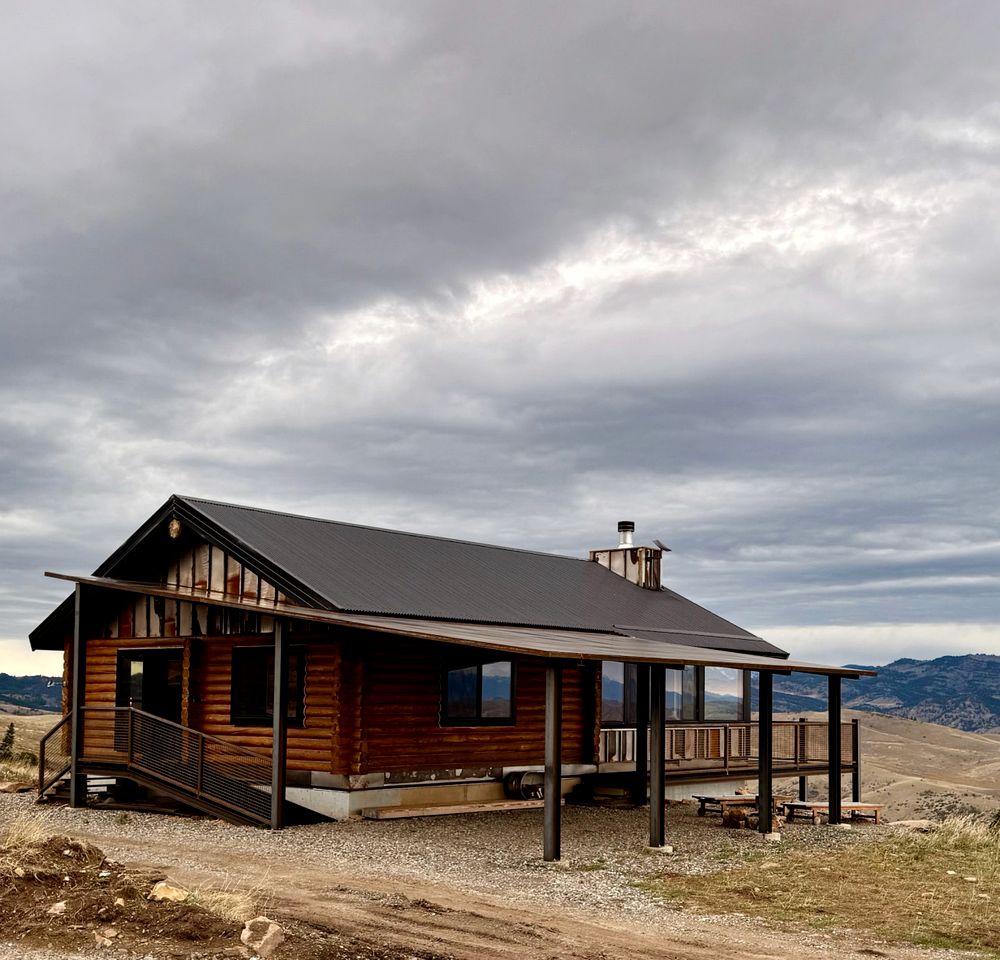 Rustic Mountain Cabin Retreat with Wrap-Around Porch & Scenic Views Near Livingston, Montana