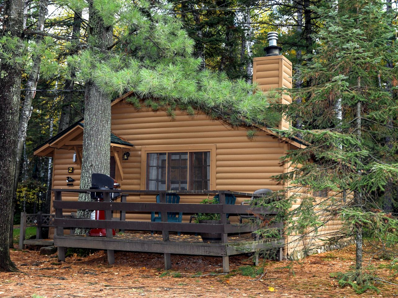 Secluded Rustic-Modern Cabin with Rock Fireplace & Pine-Surrounded Deck Near Babbitt, Minnesota