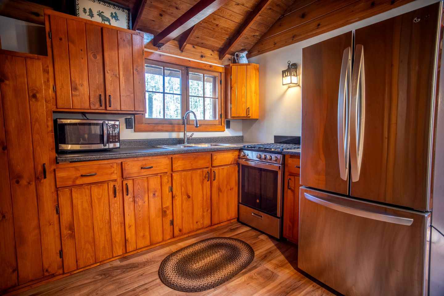 Secluded Rustic-Modern Cabin with Rock Fireplace & Pine-Surrounded Deck Near Babbitt, Minnesota