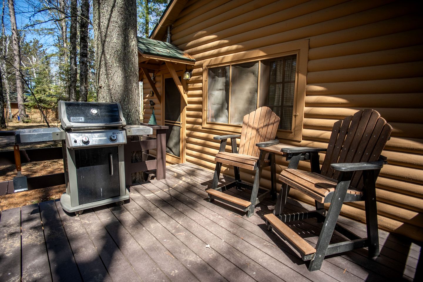 Secluded Rustic-Modern Cabin with Rock Fireplace & Pine-Surrounded Deck Near Babbitt, Minnesota
