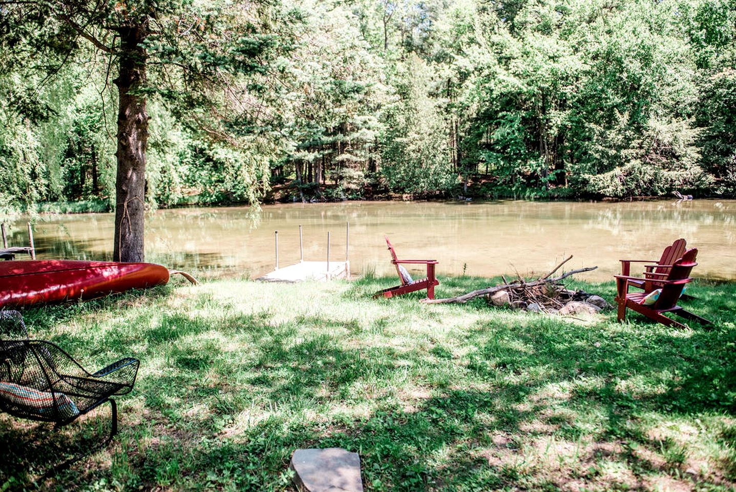 Fantastic Cottage with Fire Pit and River Access in Bellaire, Michigan