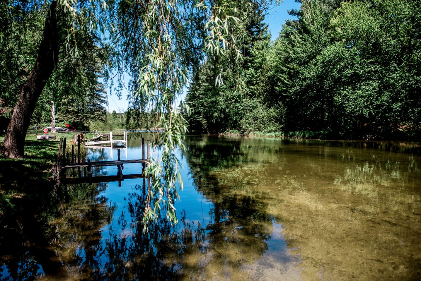 Fantastic Cottage with Fire Pit and River Access in Bellaire, Michigan