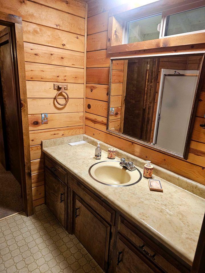 Peaceful Mountain Cabin with Private Lake and Game Room Near Long Barn, California