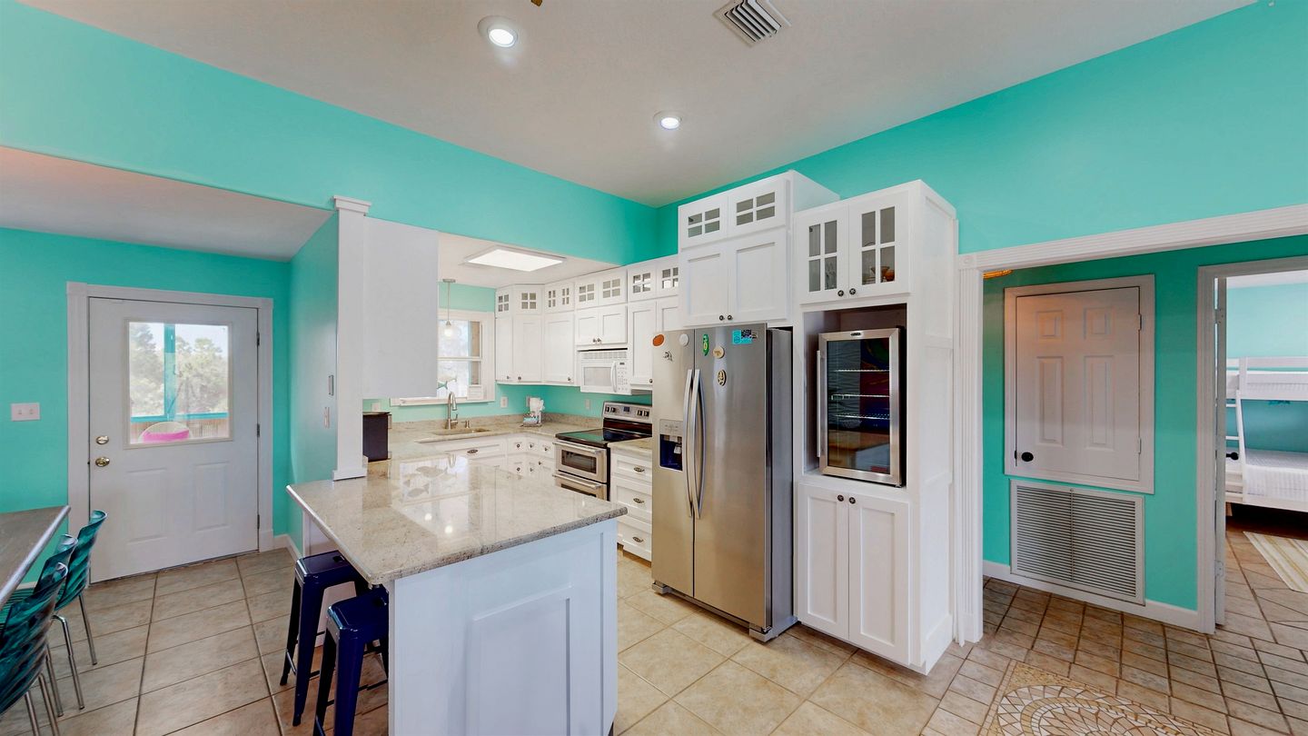 Charming Beachside Home with Private Patio & Dog-Friendly Policy near Surfside Shores, Gulf Shores, AL