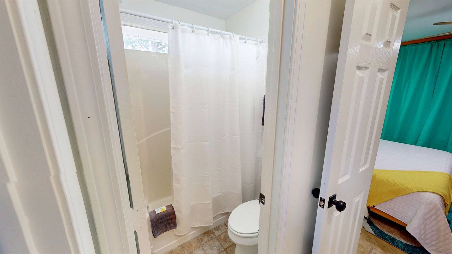 Charming Beachside Home with Private Patio & Dog-Friendly Policy near Surfside Shores, Gulf Shores, AL