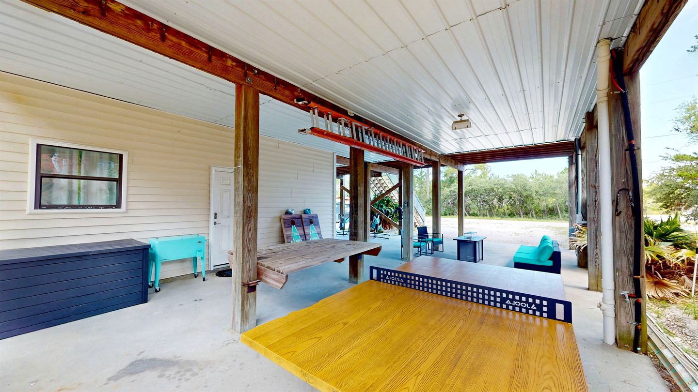 Charming Beachside Home with Private Patio & Dog-Friendly Policy near Surfside Shores, Gulf Shores, AL