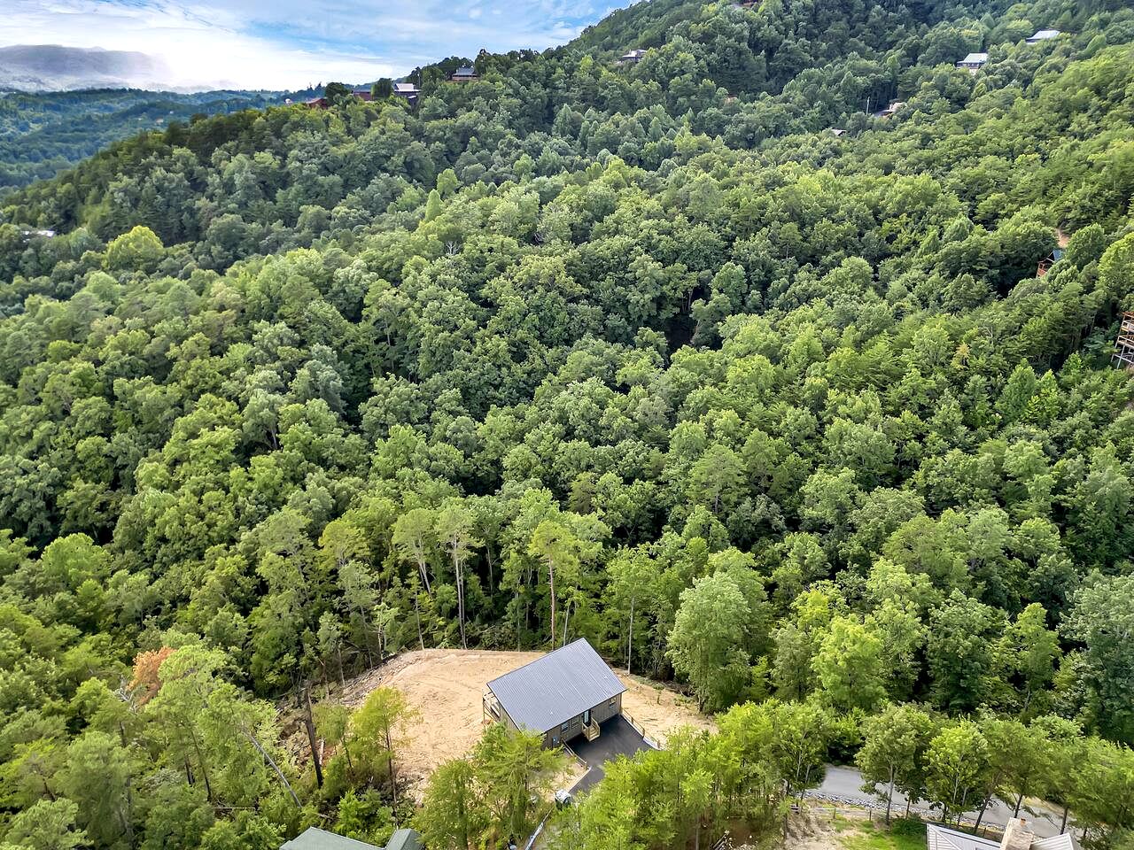 Modern Mountain-Top Chalet with Glass-Wall Views near Dollywood in Pigeon Forge, Tennessee