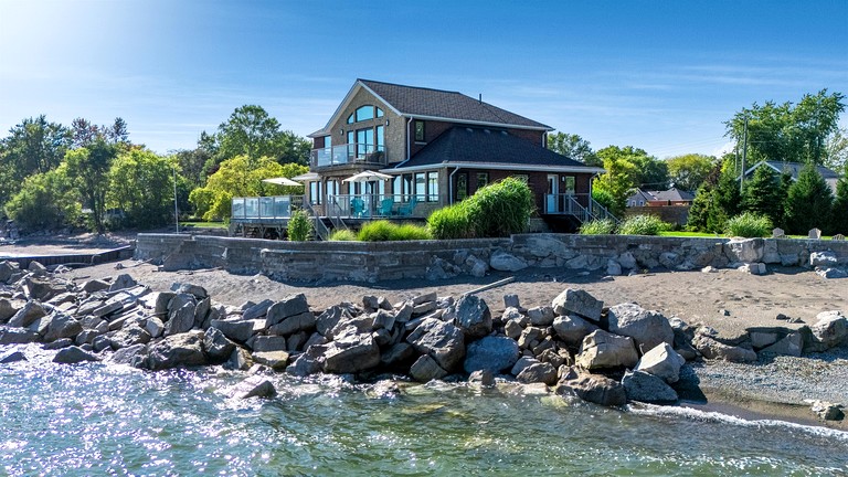 Luxury Waterfront Estate with Beach Access and Expansive Grounds in Ontario, Canada