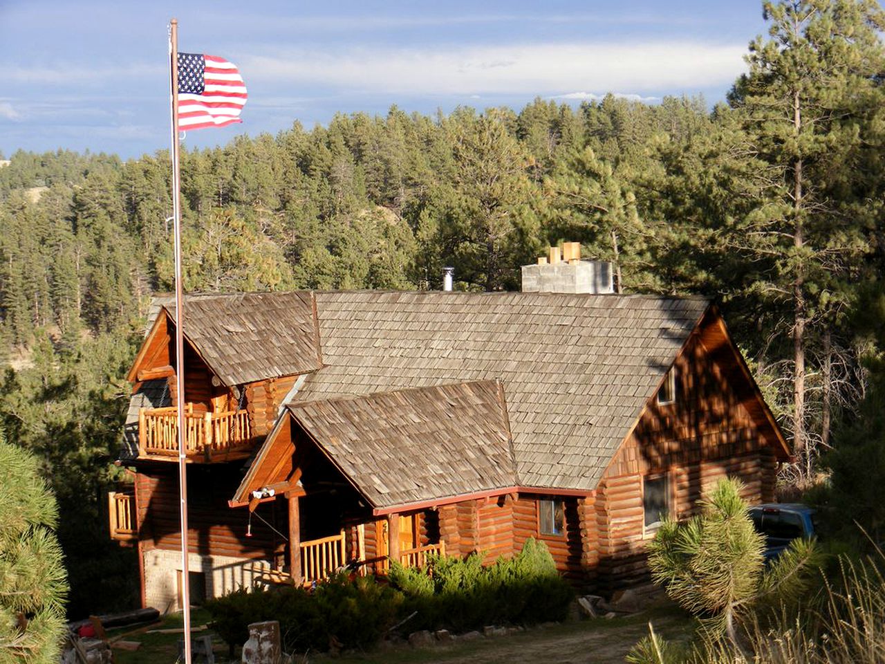 Traditional Log Cabin Rental with Deck in the Pine Forests of Columbus, Montana