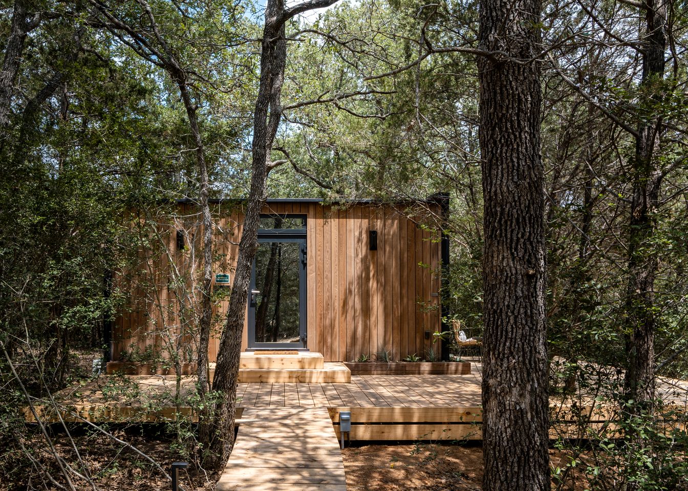 Romantic Mirror Cabin Retreat by the Lake in the Enchanted Forests of Texas