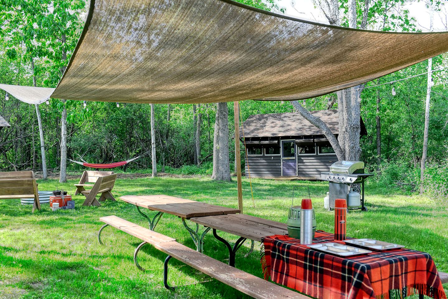 Three Cozy Historic Scout Cabins with Fire Pit, BBQ, and Hammocks for a Memorable Family Adventure in Troy, Wisconsin