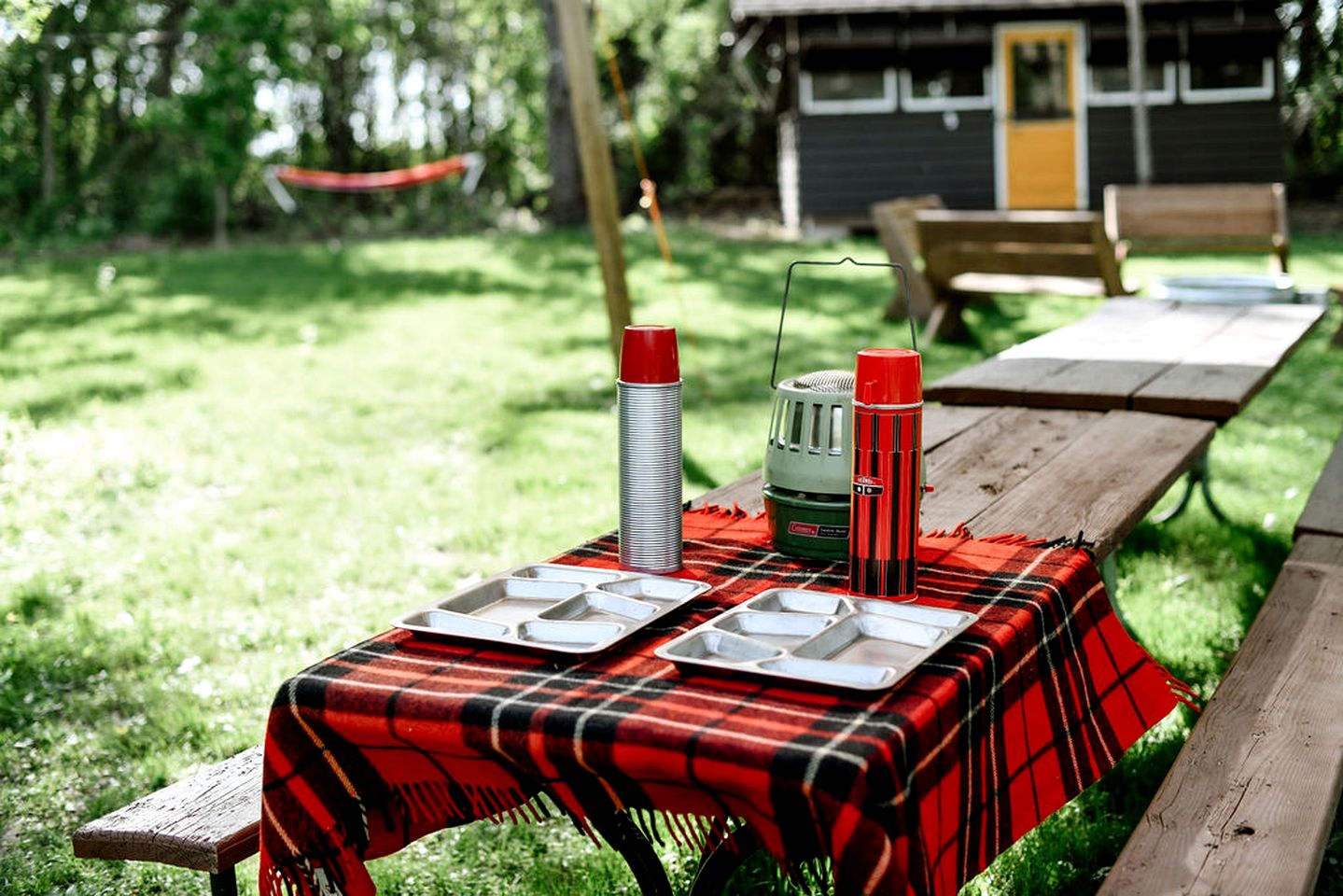 Three Cozy Historic Scout Cabins with Fire Pit, BBQ, and Hammocks for a Memorable Family Adventure in Troy, Wisconsin