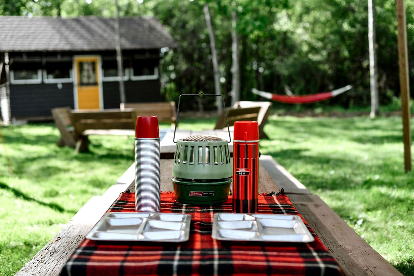 Three Cozy Historic Scout Cabins with Fire Pit, BBQ, and Hammocks for a Memorable Family Adventure in Troy, Wisconsin