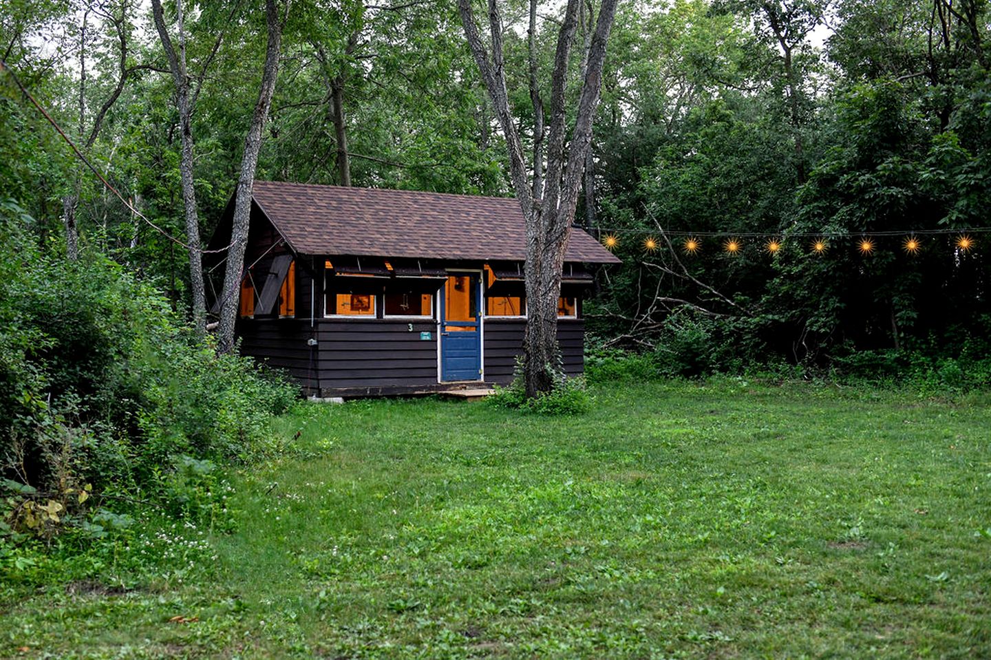 Three Cozy Historic Scout Cabins with Fire Pit, BBQ, and Hammocks for a Memorable Family Adventure in Troy, Wisconsin