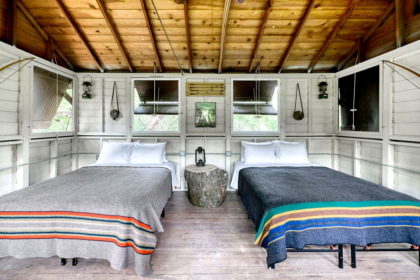 Three Cozy Historic Scout Cabins with Fire Pit, BBQ, and Hammocks for a Memorable Family Adventure in Troy, Wisconsin