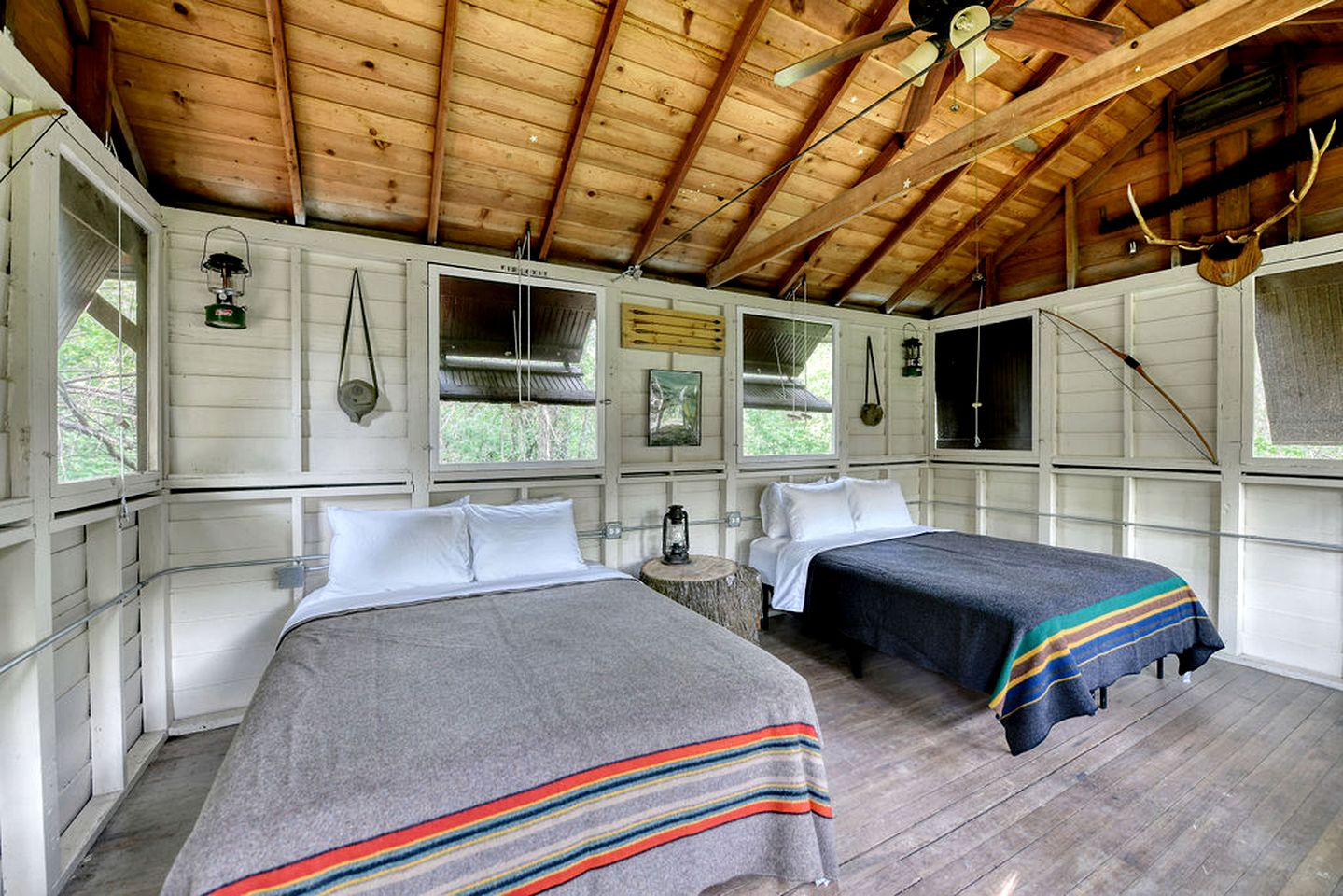Three Cozy Historic Scout Cabins with Fire Pit, BBQ, and Hammocks for a Memorable Family Adventure in Troy, Wisconsin