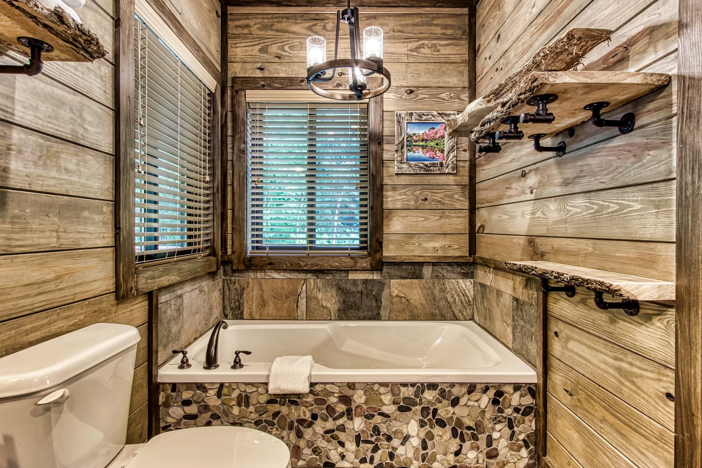 Mountain Glamping Cabin with Pool and Arcade in Pigeon Forge, Tennessee