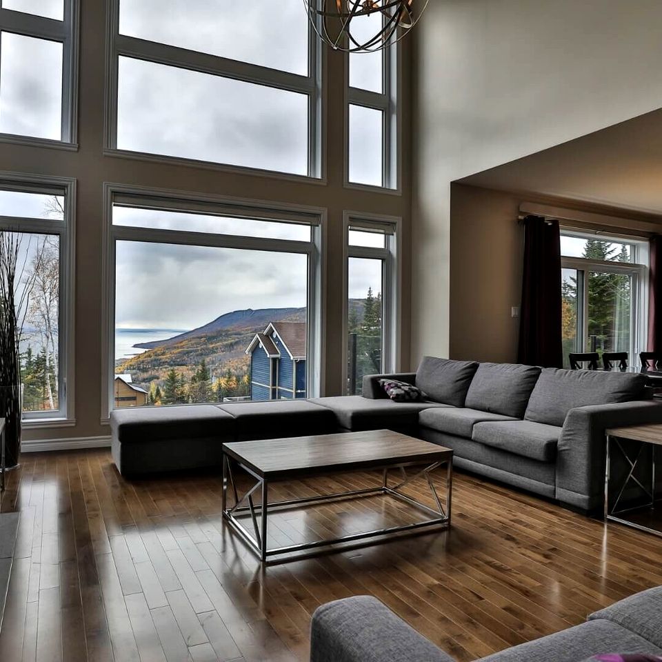Spacious Cottage with River Views and Spa in Quebec