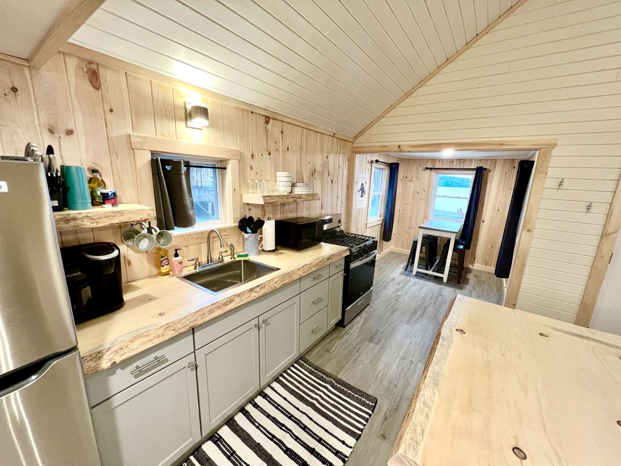 Cozy Lakefront Cabin with Porch, Firepit, Kayaks & Sandy Beach Access in Burnham, Maine
