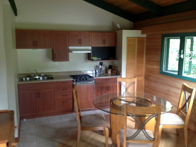 Kitchen and dining table in beach rental in Bliss Landing, BC