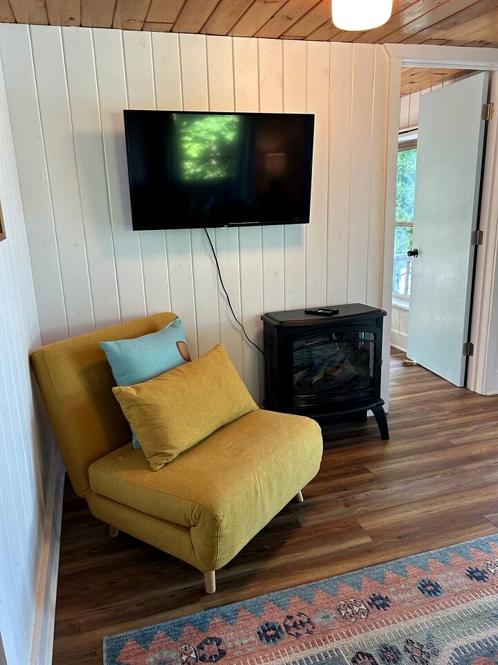 Charming Lakefront Cabin with Hot Tub and Beach Access near Traverse City, Michigan