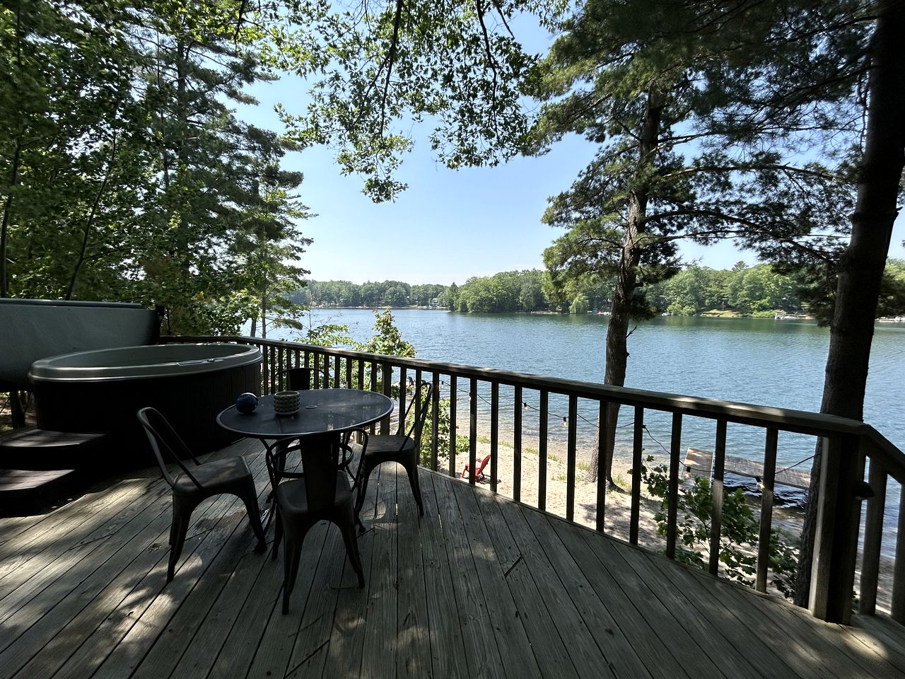 Charming Lakefront Cabin with Hot Tub and Beach Access near Traverse City, Michigan