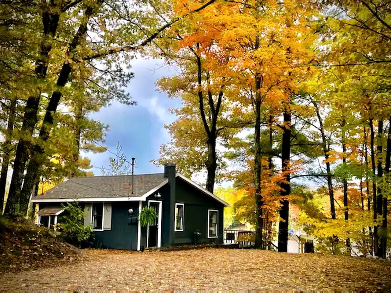 Charming Lakefront Cabin with Hot Tub and Beach Access near Traverse City, Michigan