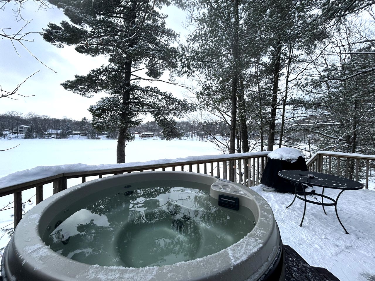 Charming Lakefront Cabin with Hot Tub and Beach Access near Traverse City, Michigan