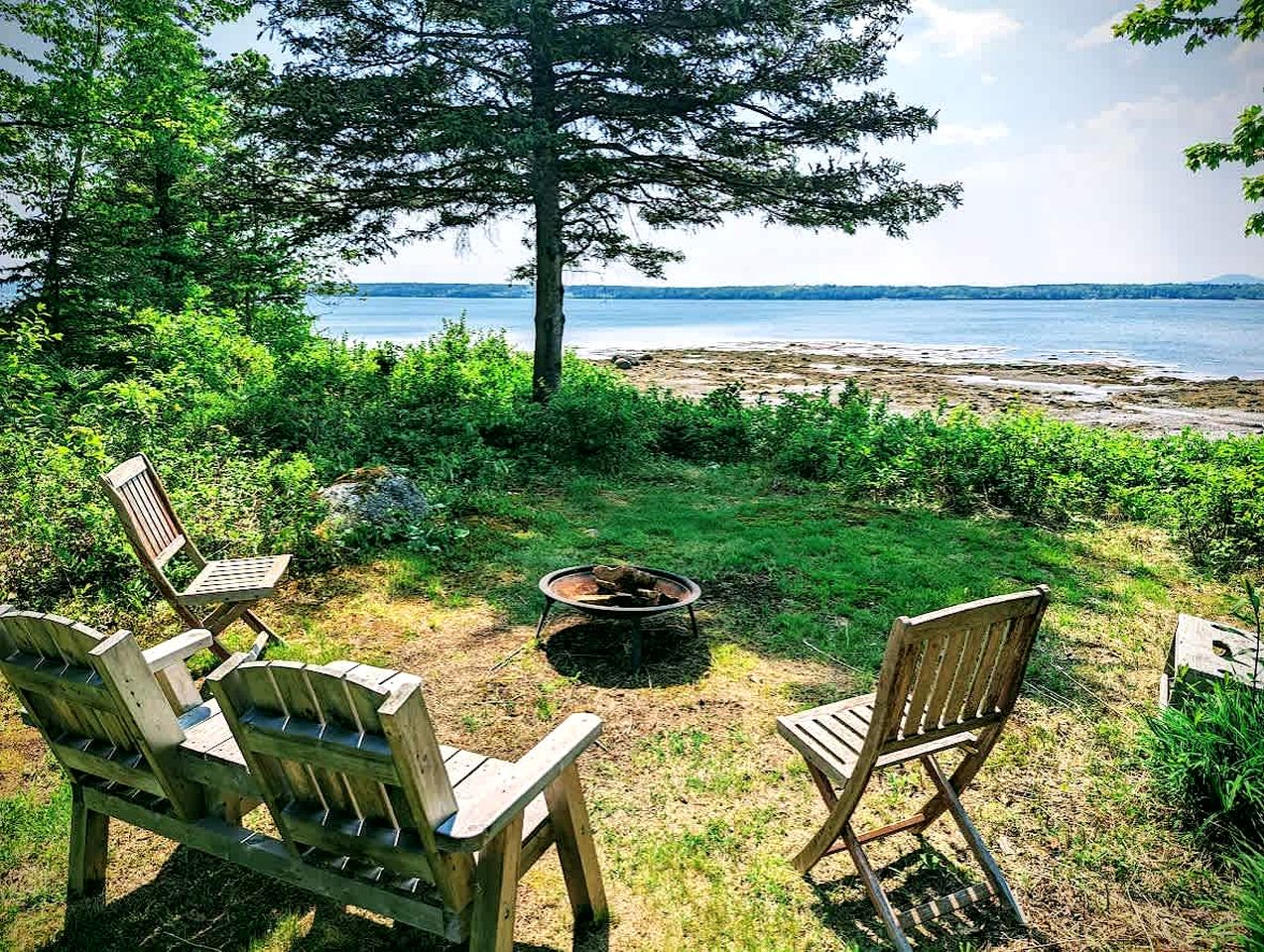 Serene Waterfront Beach House with Private Shoreline & Fire Pit Near Acadia National Park | Trenton, Maine