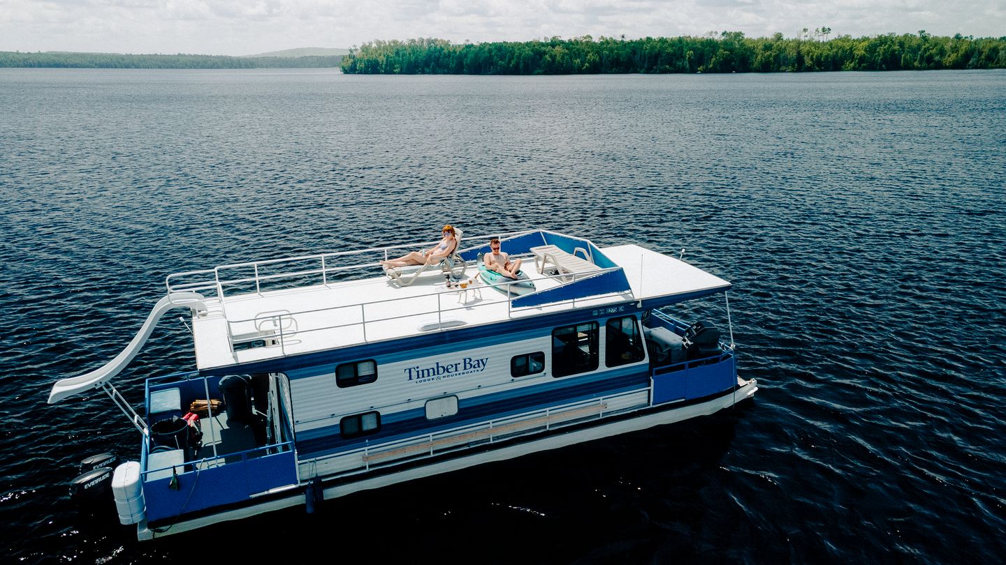 Spacious Getaway Series Houseboat with Water Slide & Penthouse Deck Near Babbitt, Minnesota