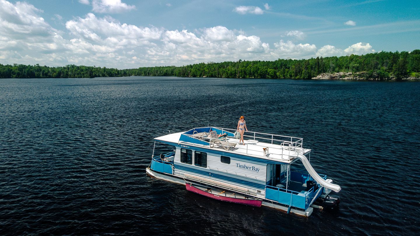 Spacious Getaway Series Houseboat with Water Slide & Penthouse Deck Near Babbitt, Minnesota