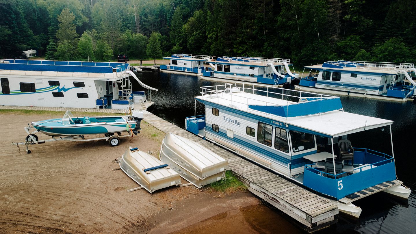Versatile Sportsman Houseboat with Wraparound Fishing Deck & Water Slide Near Babbitt, MN
