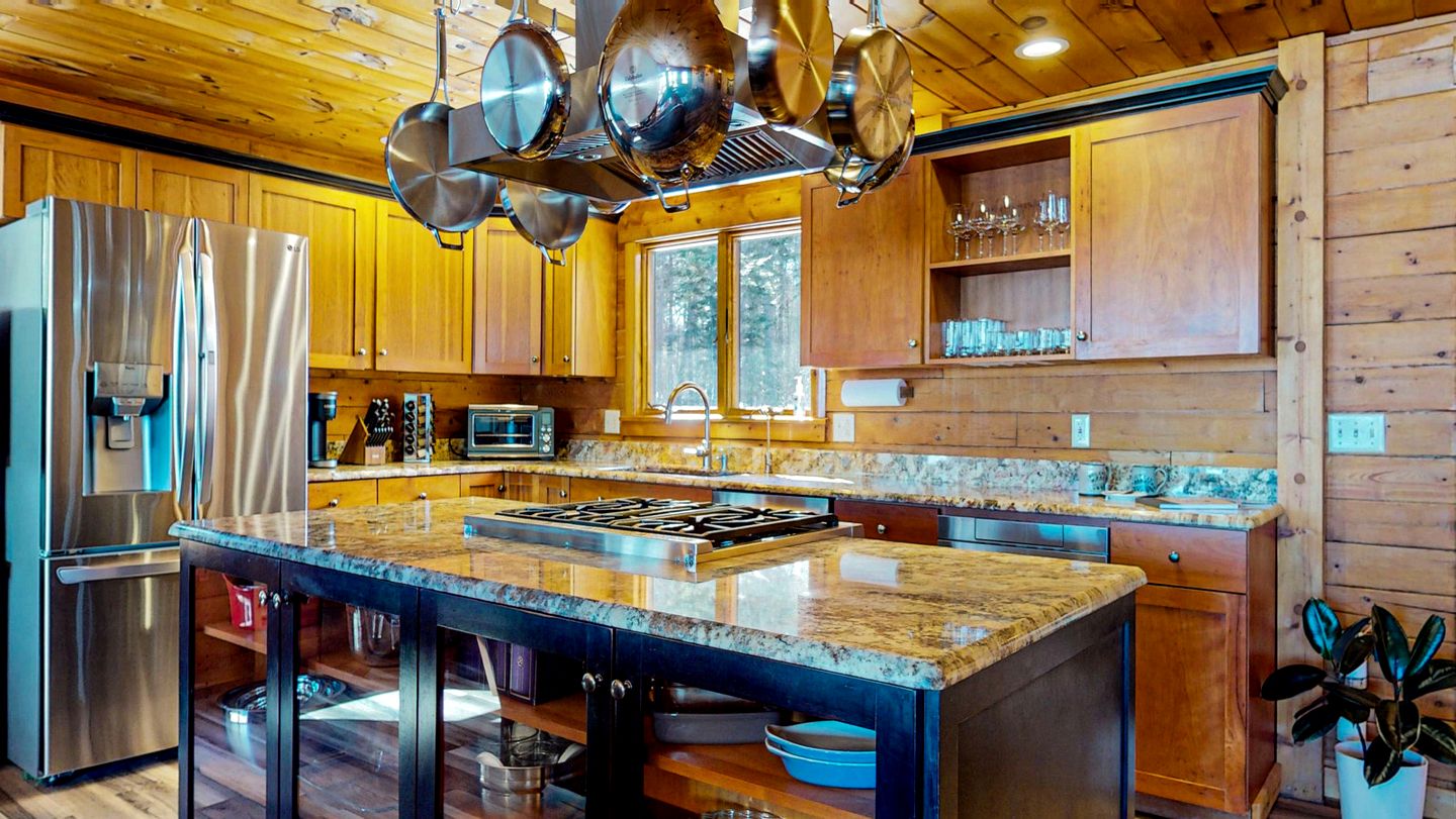 Ultimate Four-Season Escape with Scenic Porch Views in Rockwood, Maine