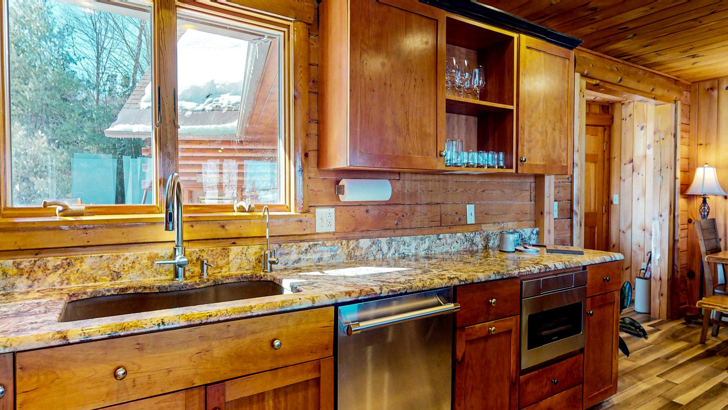 Ultimate Four-Season Escape with Scenic Porch Views in Rockwood, Maine