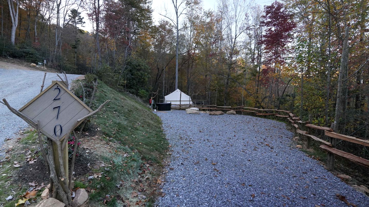 Tree Covered Glamping Hideaway with Hot Tub, Bell Tent and Elevated Deck in Waynesville, North Carolina