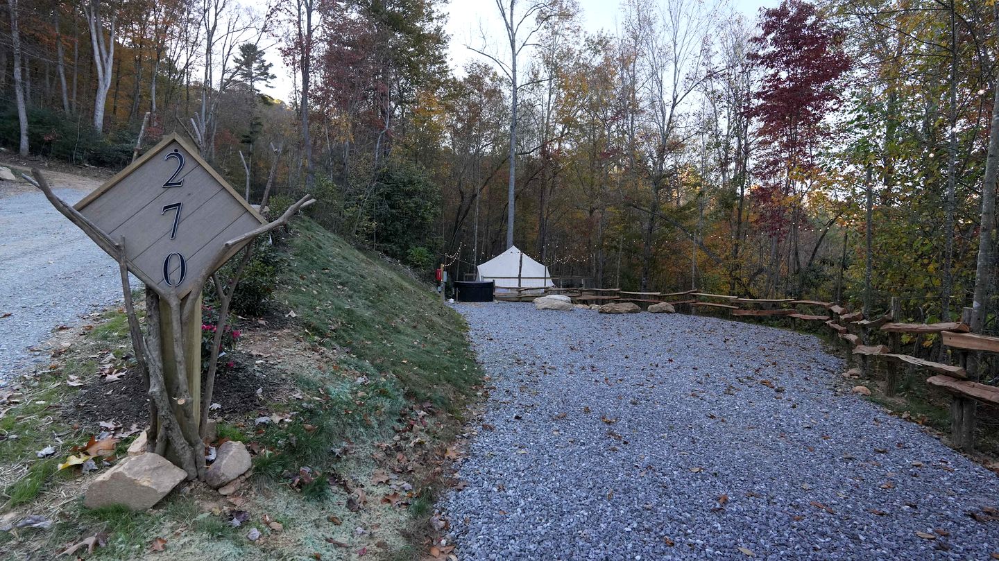 Tree Covered Glamping Hideaway with Hot Tub, Bell Tent and Elevated Deck in Waynesville, North Carolina