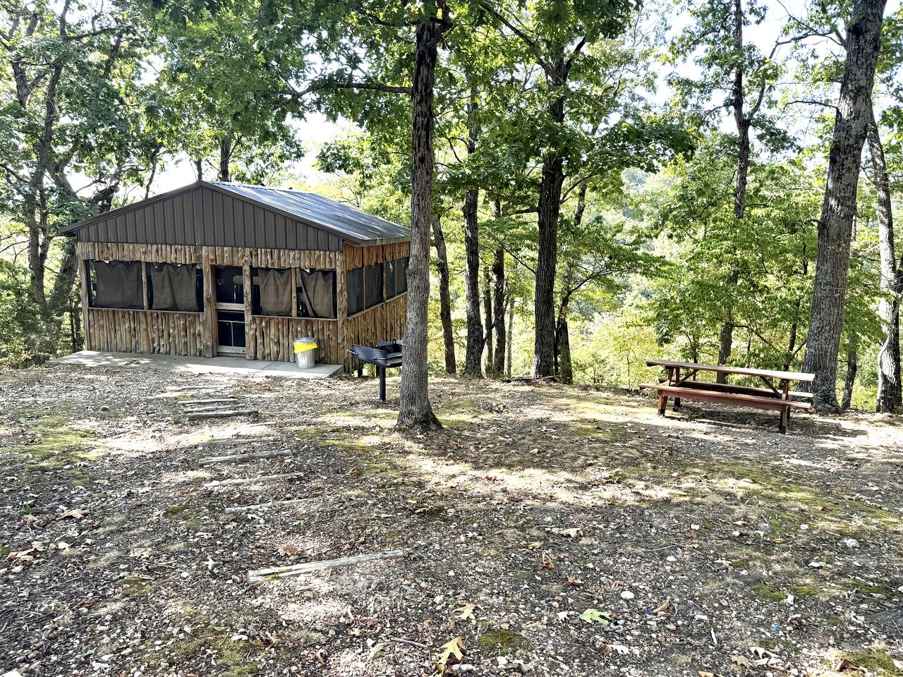 Shady Family Tree Hut Glamping Cabins with Private Door & Mosquito Nets near Big Niangua River, Macks Creek, Missouri