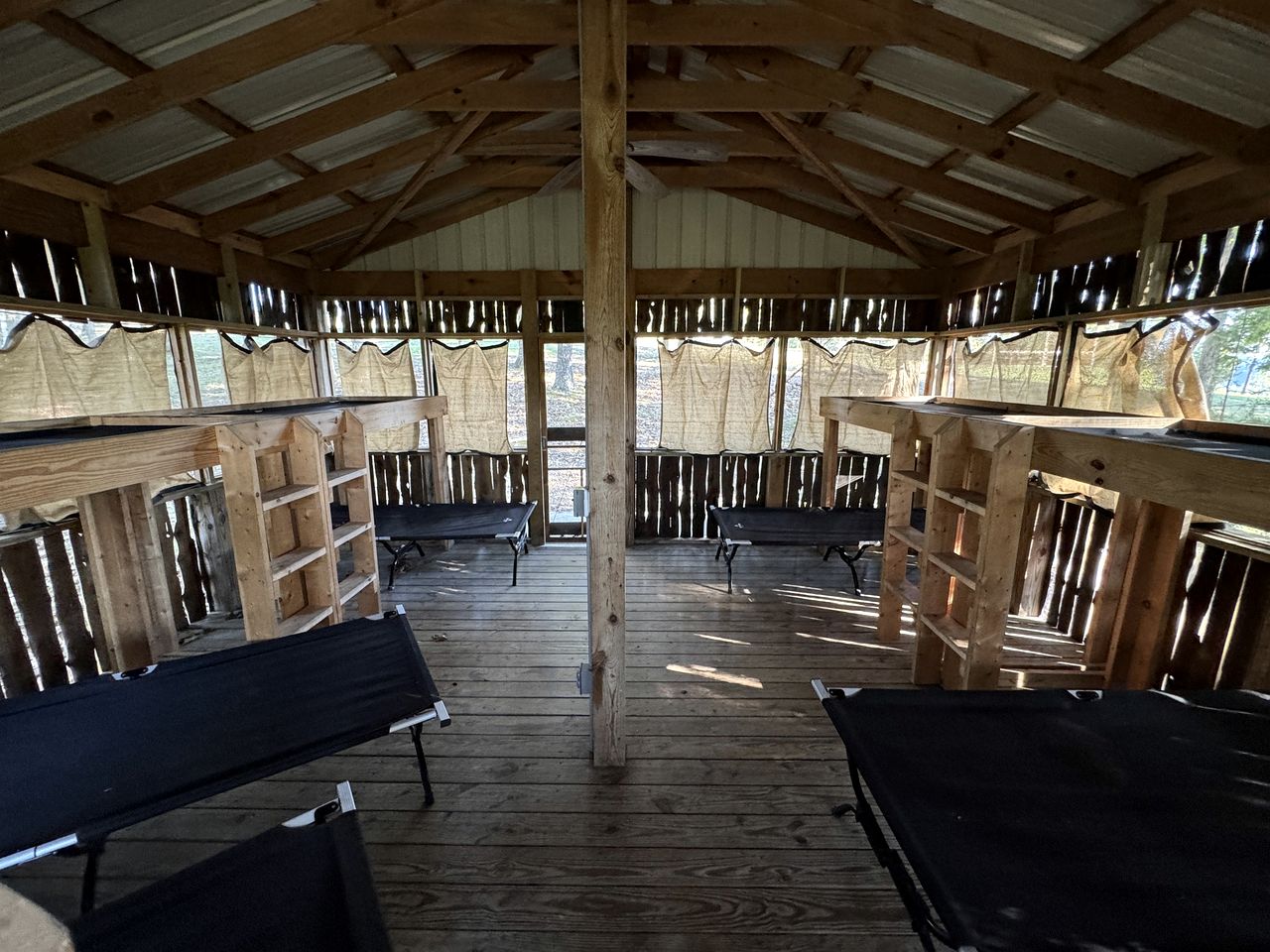 Shady Family Tree Hut Glamping Cabins with Private Door & Mosquito Nets near Big Niangua River, Macks Creek, Missouri