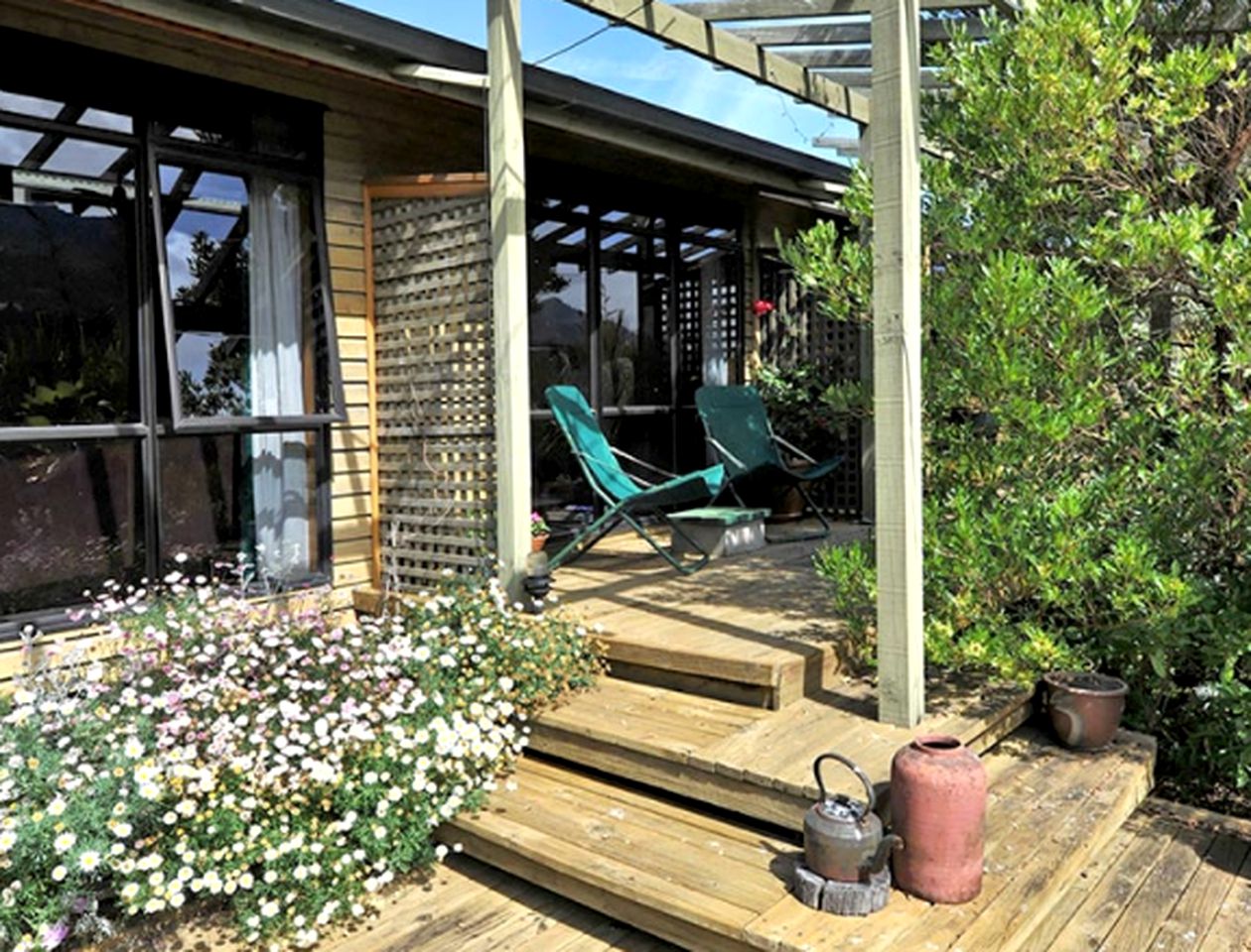 Chinese-Inspired Room Rental with Private Deck in Golden Bay, New Zealand