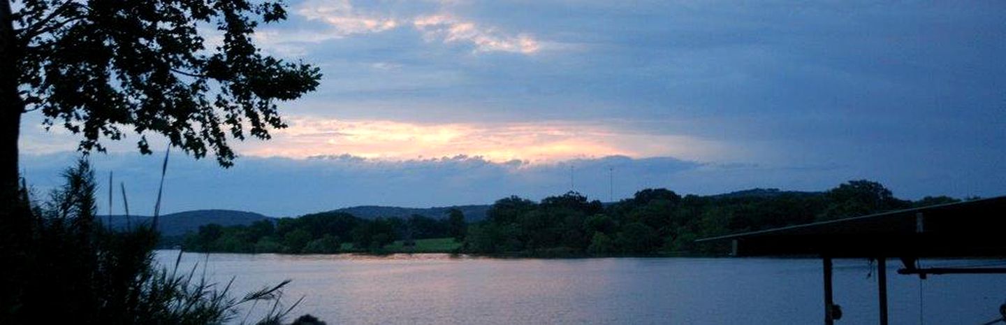 Cozy Cottage Rental with Lake Views from Private Deck near Austin