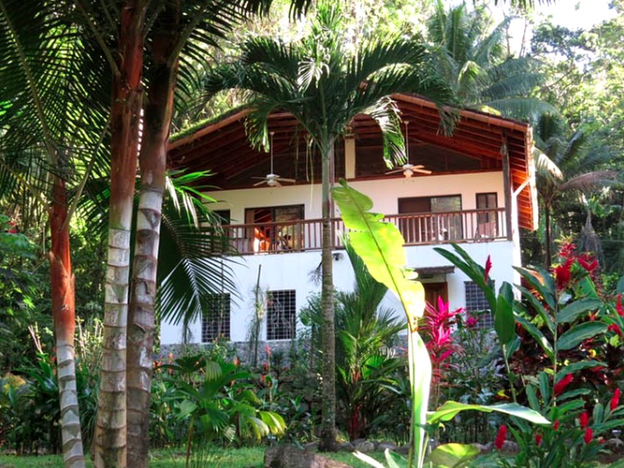 Tranquil Cottage Rental Surrounded by a Palm Garden near Cacao Lagoon, Honduras