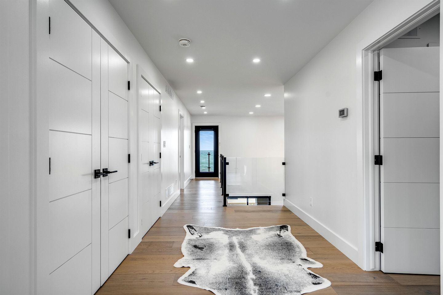 Sophisticated Shoreline Retreat with Sunset Patio & Poolside Lounging in Ontario, Canada