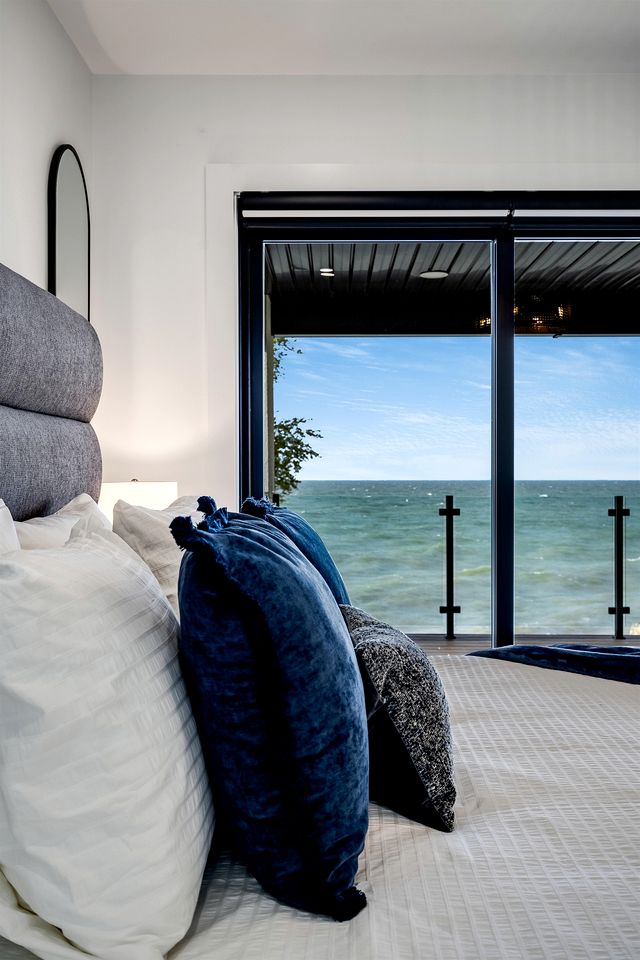 Sophisticated Shoreline Retreat with Sunset Patio & Poolside Lounging in Ontario, Canada