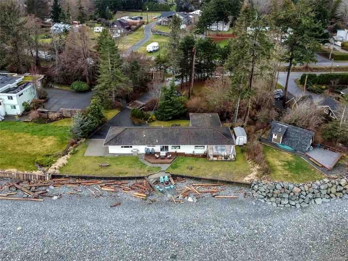 Coastal Oceanfront Retreat with Pebble Beach Access Located Near Stories Beach in Campbell River, BC